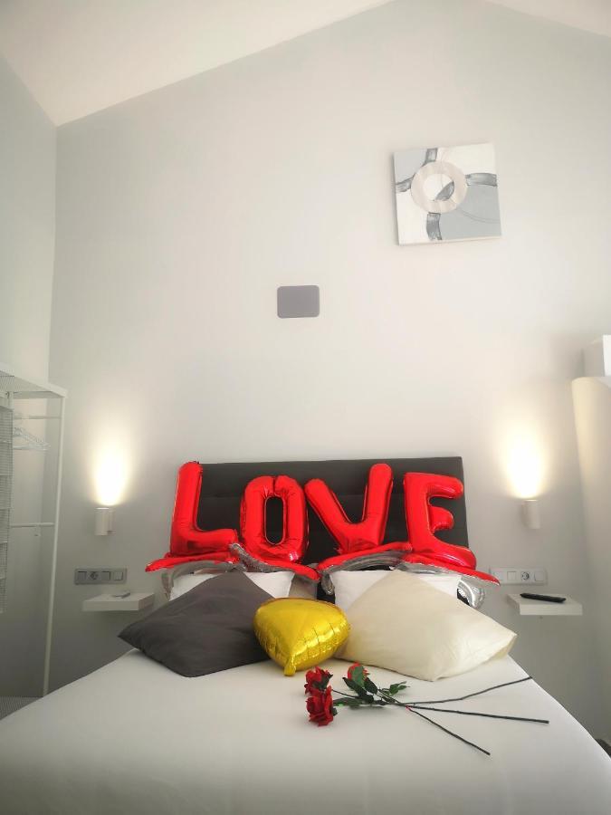 Eres Emerita "Apartamentos & Suites" เมรีดา ภายนอก รูปภาพ