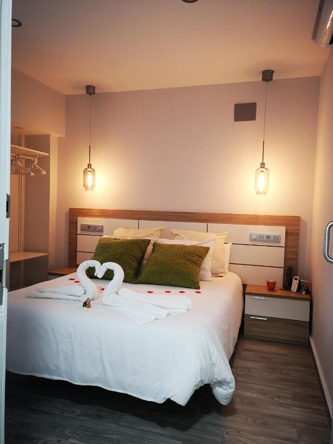Eres Emerita "Apartamentos & Suites" เมรีดา ภายนอก รูปภาพ